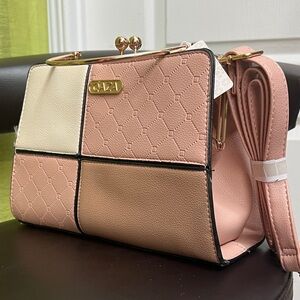 Pink and Cream Women's Handbag
Also have other colours as you can see